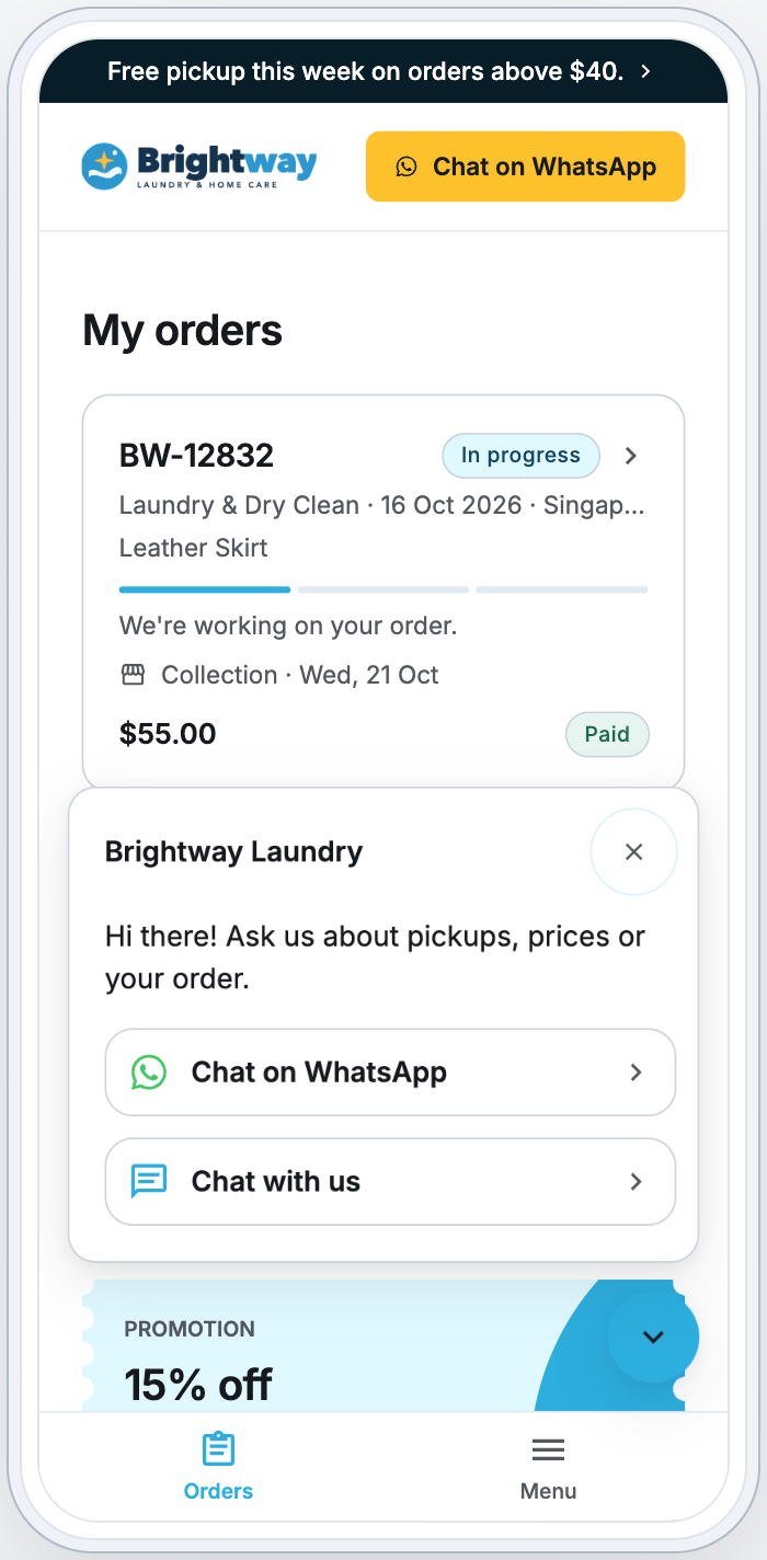The Contact widget open on a phone, with the greeting, Chat with us and Chat on WhatsApp